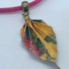 Collier fuchsia et doré origami PLUME